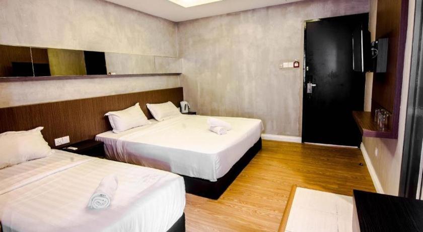 Monaco Boutique Hotel Sadong Jaya Kota Kinabalu Exterior foto